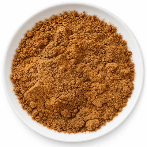 Apple Pie Seasoning dry spice blend on a plain white plate