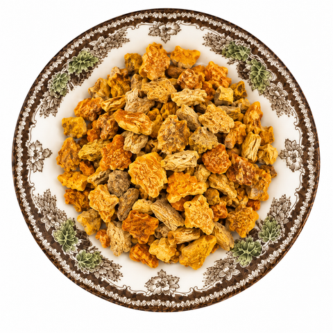 Turmeric Root Organic dried product on a floral transferware plate