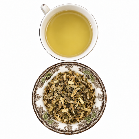 Watercress loose dried herb on a floral transferware plate with a cup of steeped infusion