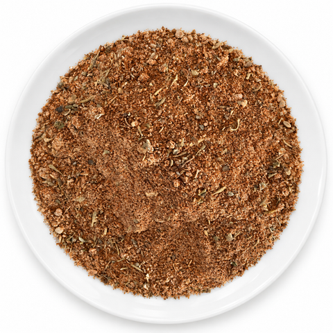 Cajun Seasoning dry spice blend on a plain white plate
