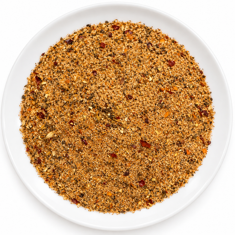 Canadian Steak Seasoning dry spice blend on a plain white plate