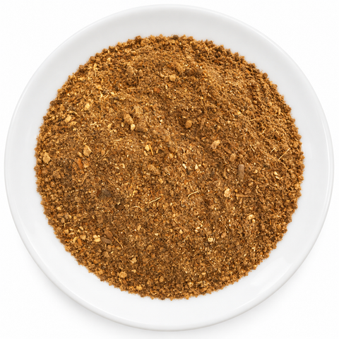 Chai Spice dry spice blend on a plain white plate