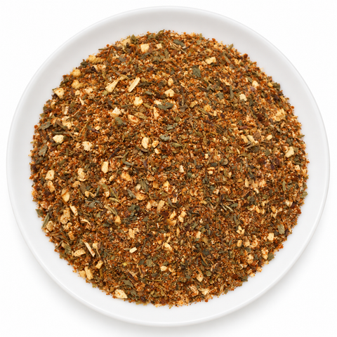 Creole Seasoning dry spice blend on a plain white plate