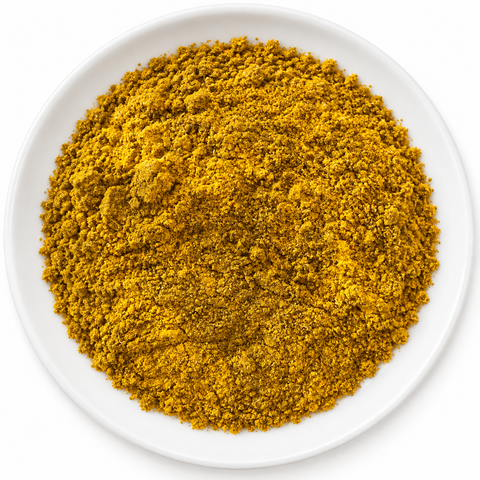Curry Powder dry spice blend on a plain white plate