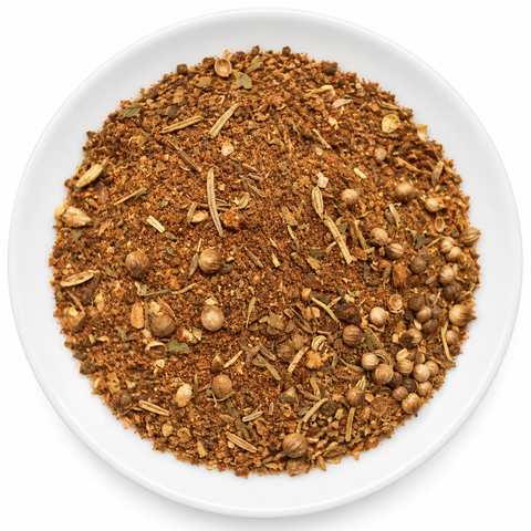 Fajita Seasoning dry spice blend on a plain white plate