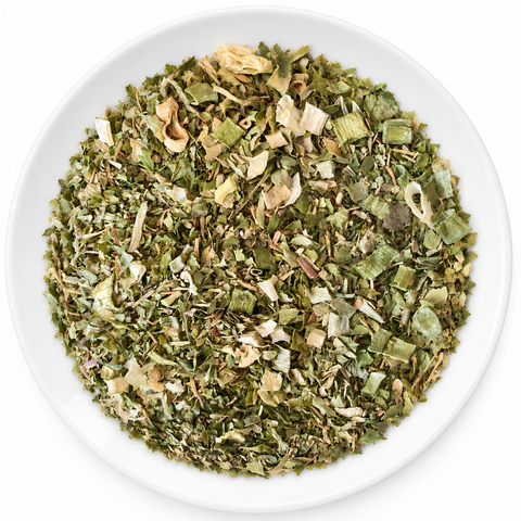 Fines Herbes dry spice blend on a plain white plate