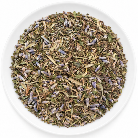 Herbes De Provence dry spice blend on a plain white plate