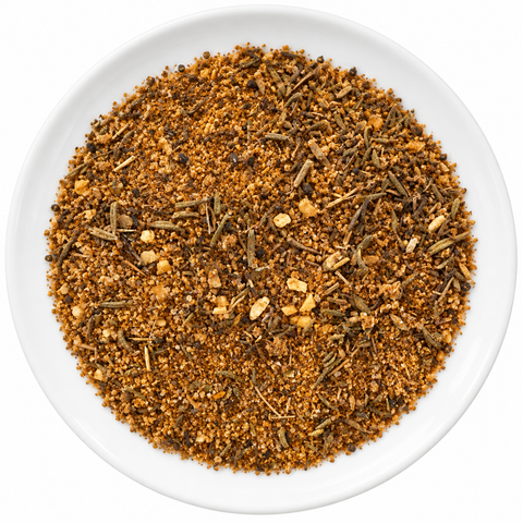 Jamaican Jerk Seasoning dry spice blend on a plain white plate