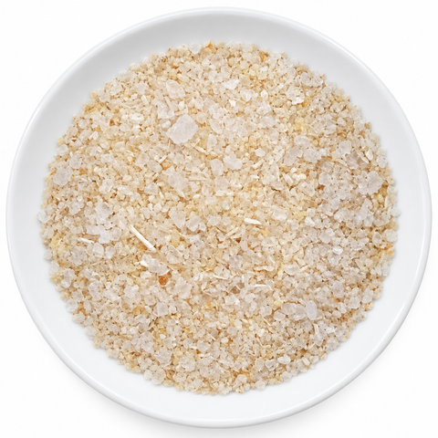 Onion Salt dry spice blend on a plain white plate