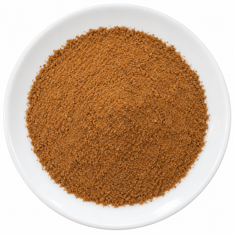 Pie Spice dry spice blend on a plain white plate