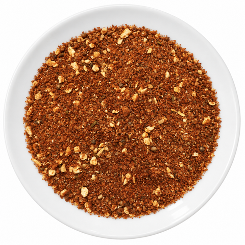 Pulled Pork Rub dry spice blend on a plain white plate
