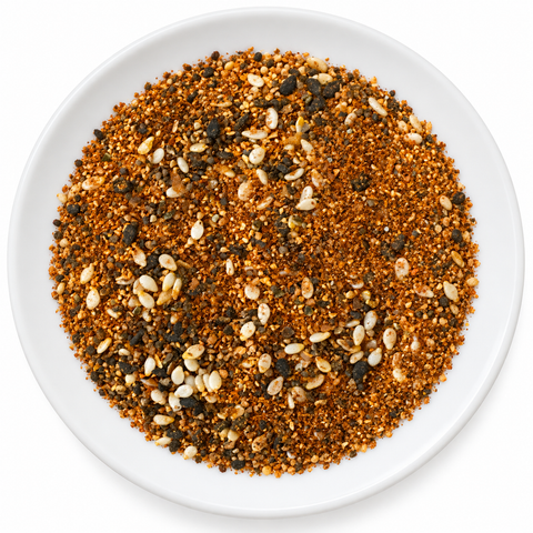 Shichimi Togarashi dry spice on a plain white plate against a white background
