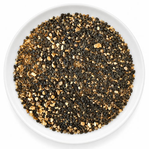 Tuna Rub dry spice on a plain white plate against a white background