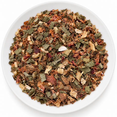 Voodoo dry spice on a plain white plate against a white background