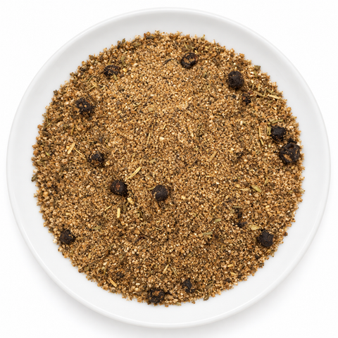 Wild Game Rub dry spice on a plain white plate against a white background