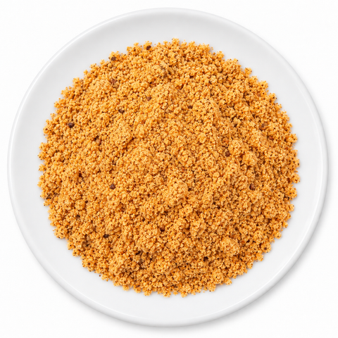 Bacon Cheddar Popcorn Seasoning on a plain white plate