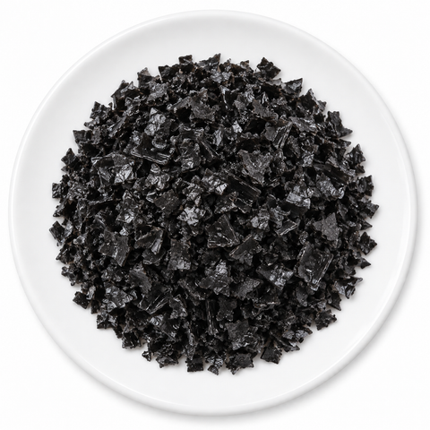 Black Cyprus Sea Salt Flake on a plain white plate
