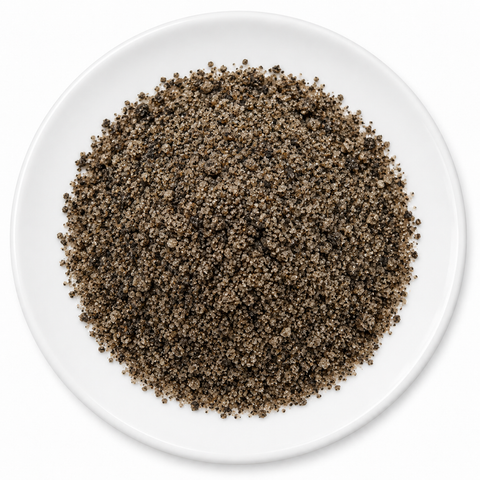 Black Lime Sugar on a plain white plate