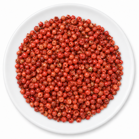 Peppercorn, Pink, whole on a plain white plate