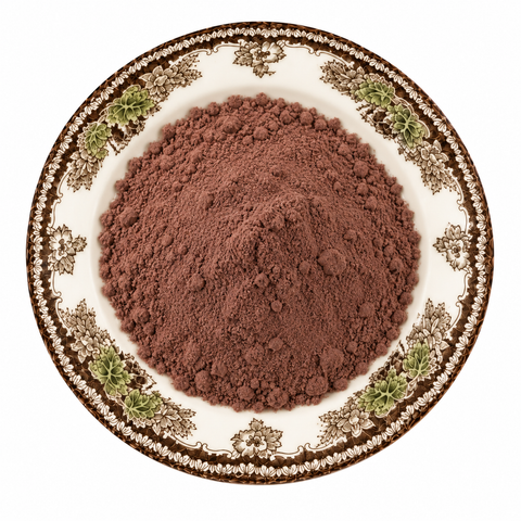 Acai Berry Powder on a cream floral plate