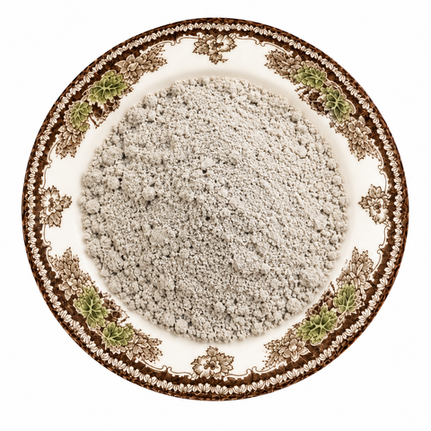 Bentonite Clay on a cream floral plate