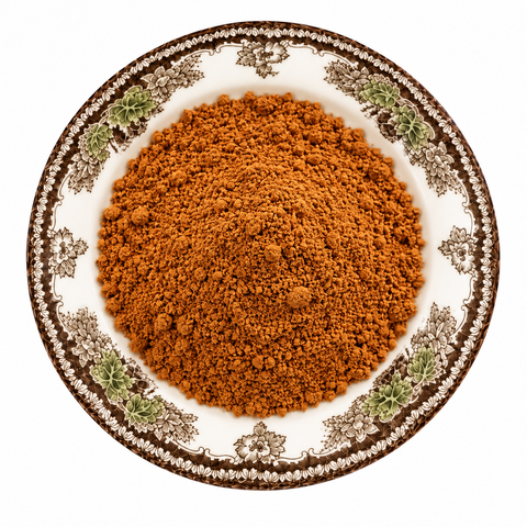 Bitter Melon, Powder on a cream floral plate
