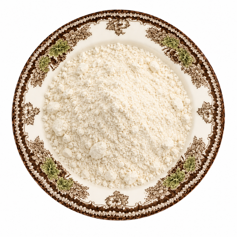 Bromelain Powder on a cream floral plate