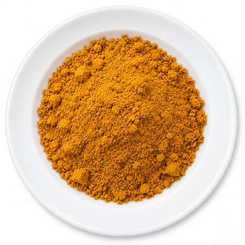Turmeric Root Powder on a plain white plate