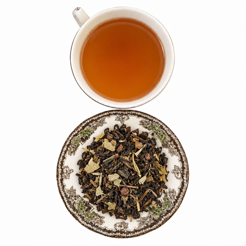 Blackberry Sage Oolong loose-leaf tea with brewed tea on a white background