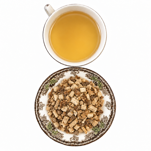 Butchers Broom Root dry product and prepared infusion on a white background