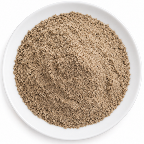 Cardamom Powder dry product on a plain white plate against a white background