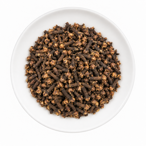 Cloves, Whole dry product on a plain white plate against a white background
