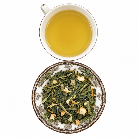 Dreamy Lemon Green Tea loose-leaf tea with brewed tea on a white background