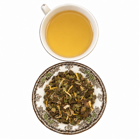 Earl Grey White loose-leaf tea with brewed tea on a white background