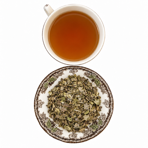 Fire Roasted Yaupon dry tea and prepared tea on a white background