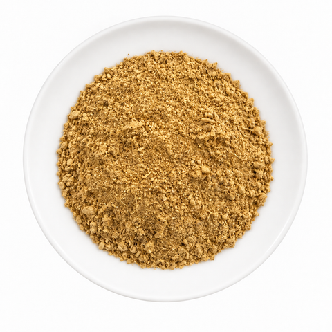 Ginger Root, Organic Powder dry product on a plain white plate against a white background