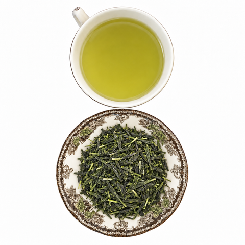 Gokujyo Uji Shincha Japanese loose-leaf tea with brewed tea on a white background