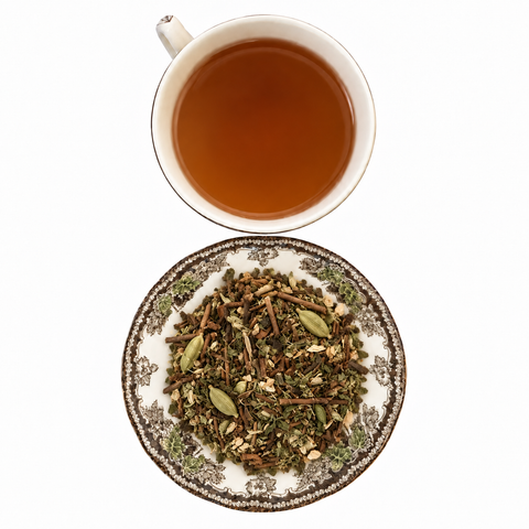 Green Mint Chai loose-leaf tea with brewed tea on a white background