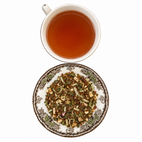 Health Tonic loose-leaf tea with brewed tea on a white background
