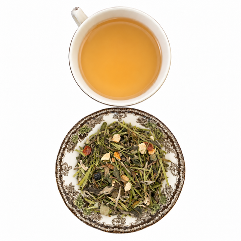 Healthy Collagen loose-leaf tea with brewed tea on a white background