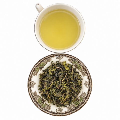 Huang Shan Bao Zhong Organic loose-leaf tea with brewed tea on a white background