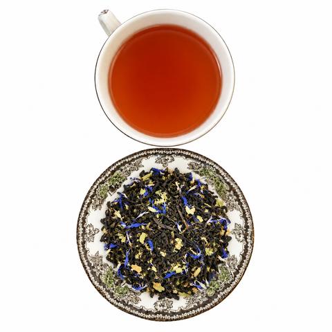 London Lapsang Earl Grey loose-leaf tea with brewed tea on a white background