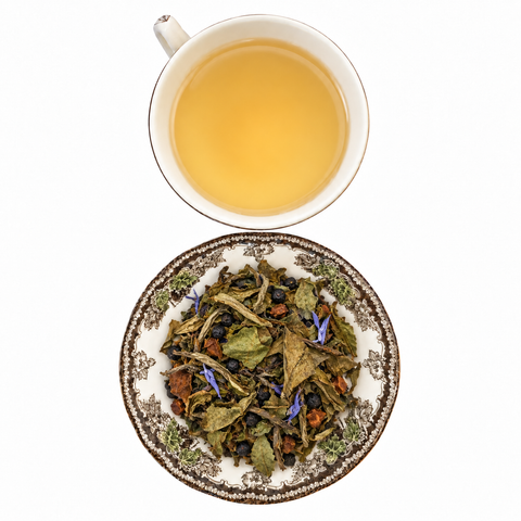 Luxury White loose-leaf tea with brewed tea on a white background
