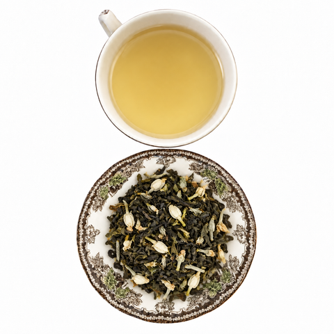 Lychee Jasmine loose-leaf tea with brewed tea on a white background