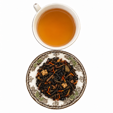 Maple Creme Oolong loose-leaf tea with brewed tea on a white background