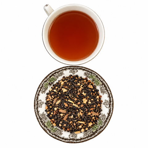 Masala Chai loose-leaf tea with brewed tea on a white background