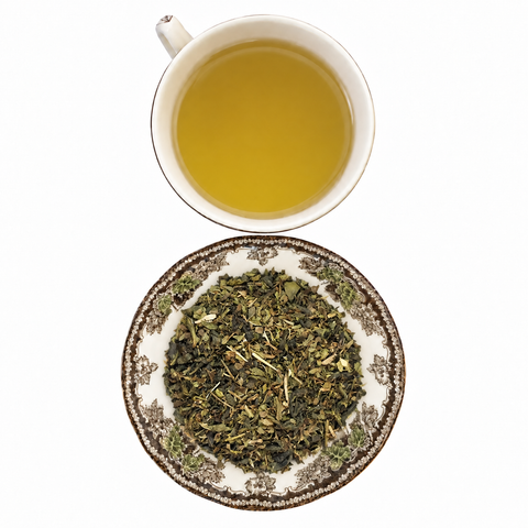 Mint Condition loose-leaf tea with brewed tea on a white background