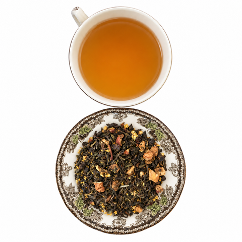 My Sweet Darjeeling loose-leaf tea with brewed tea on a white background