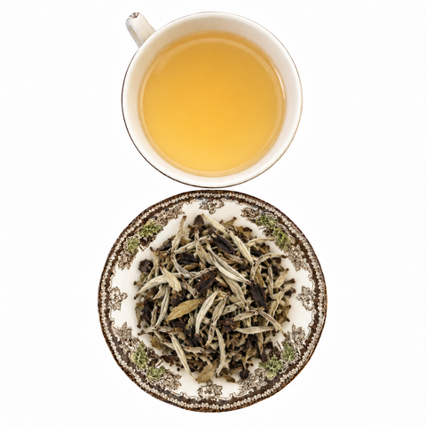 Old Tree Yue Guan Bai, Moon Light White Pu'erh loose-leaf tea with brewed tea on a white background