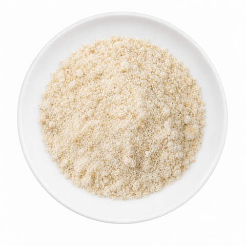 Onion Powder dry product on a plain white plate against a white background